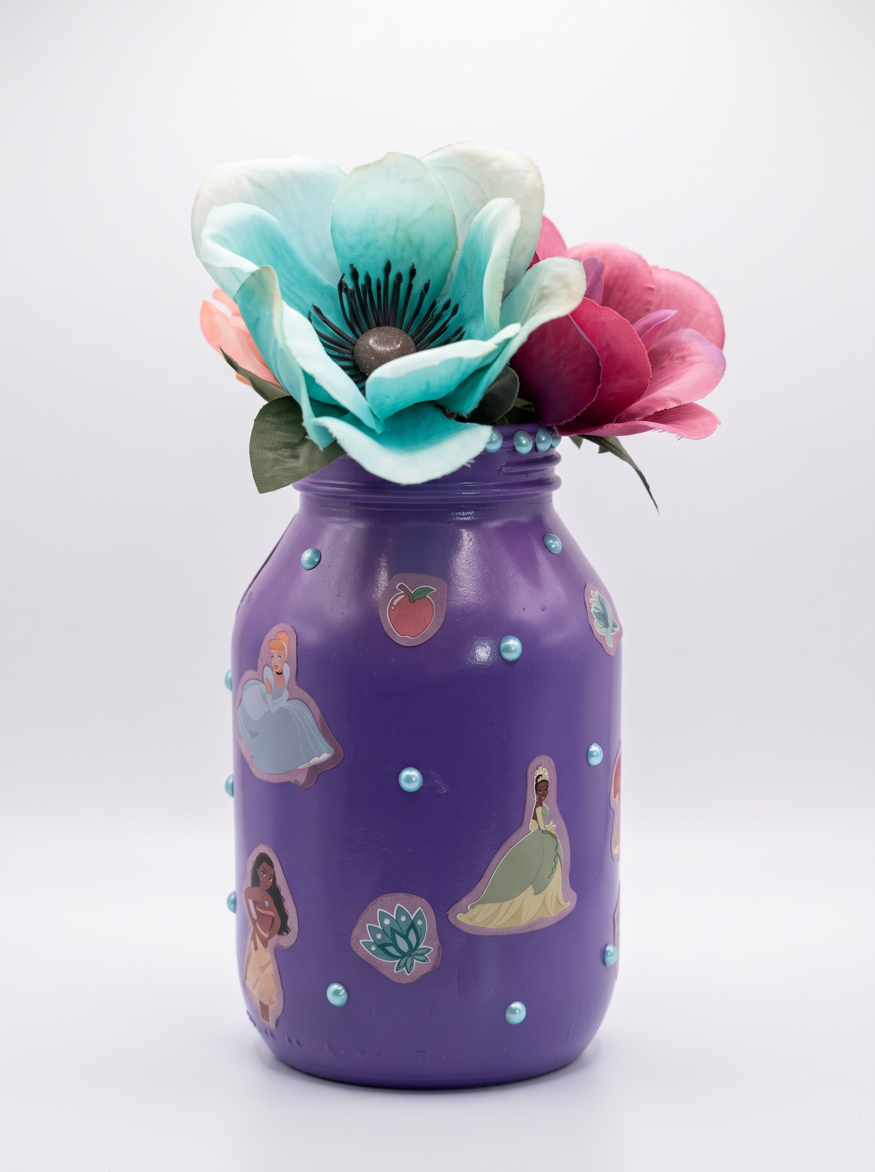 Purple princess-themed jar vase with turquoise and pink flowers