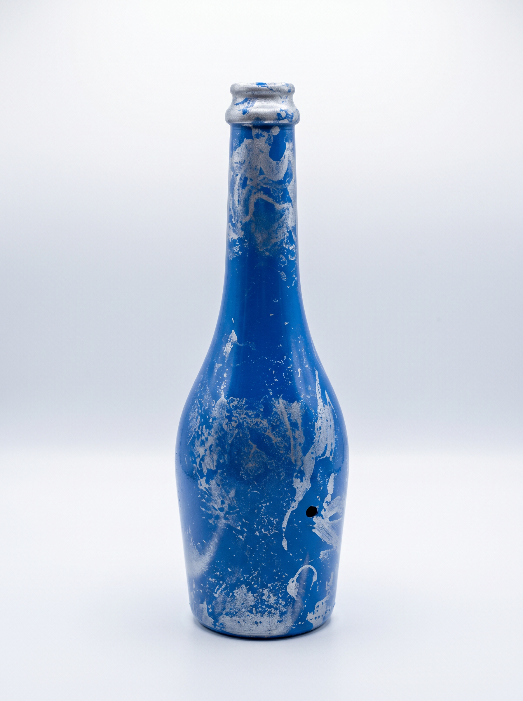 Cobalt blue and silver swirled bottle