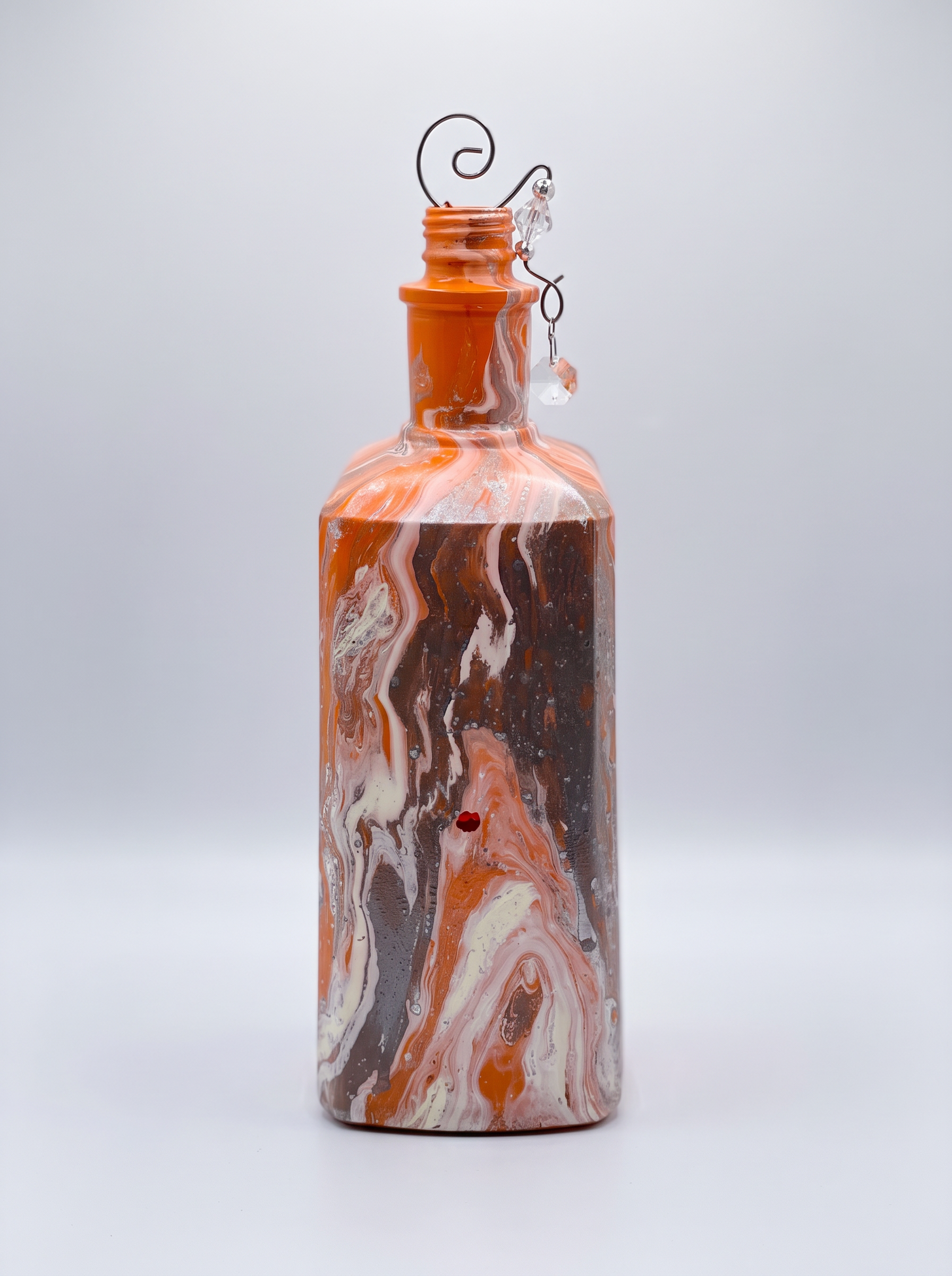 Orange, black, white and pink marbled incense burner with jeweled wire accents