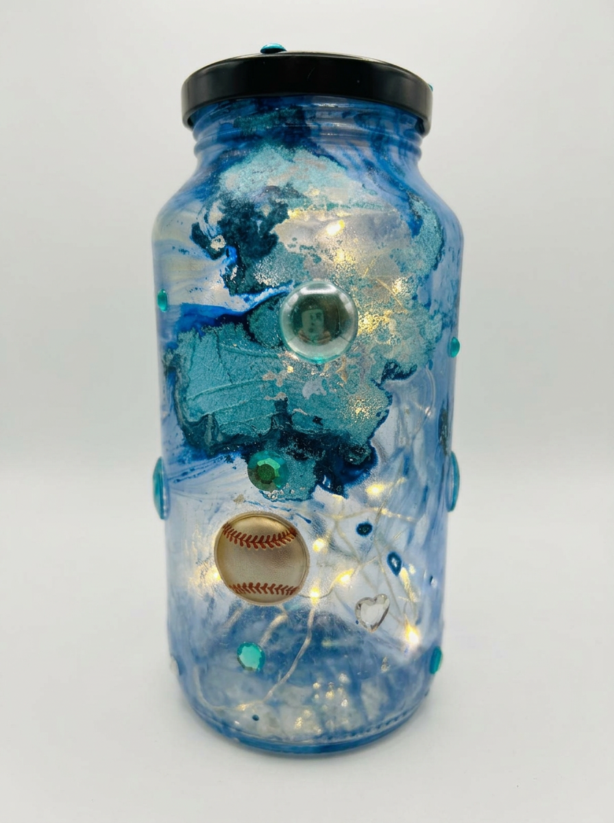 Blue and teal lighted baseball jar with sparkling gems on a clean white background